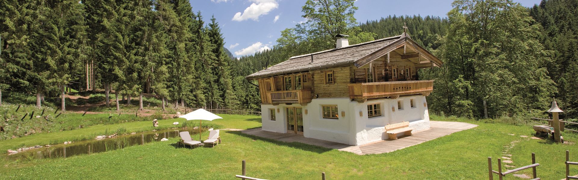 <strong>Hüttlingmoos</strong><br><br>This peaceful luxury chalet at the foot of the Wilder Kaiser makes every event an unforgettable one while also boasting an ultra-modern technical infrastructure...